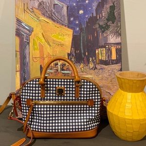 Dooney crops over bag